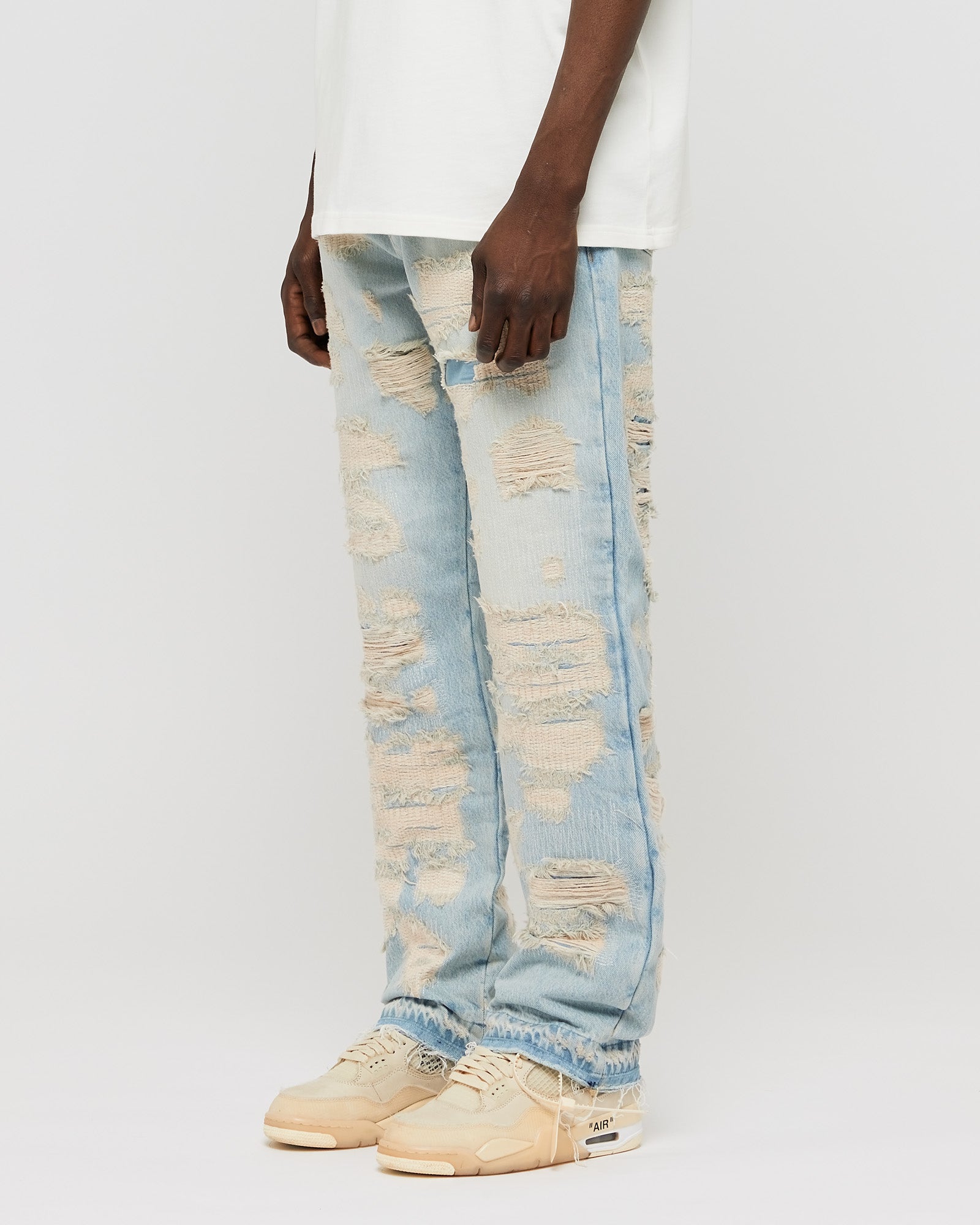 Destroyed jeans discount