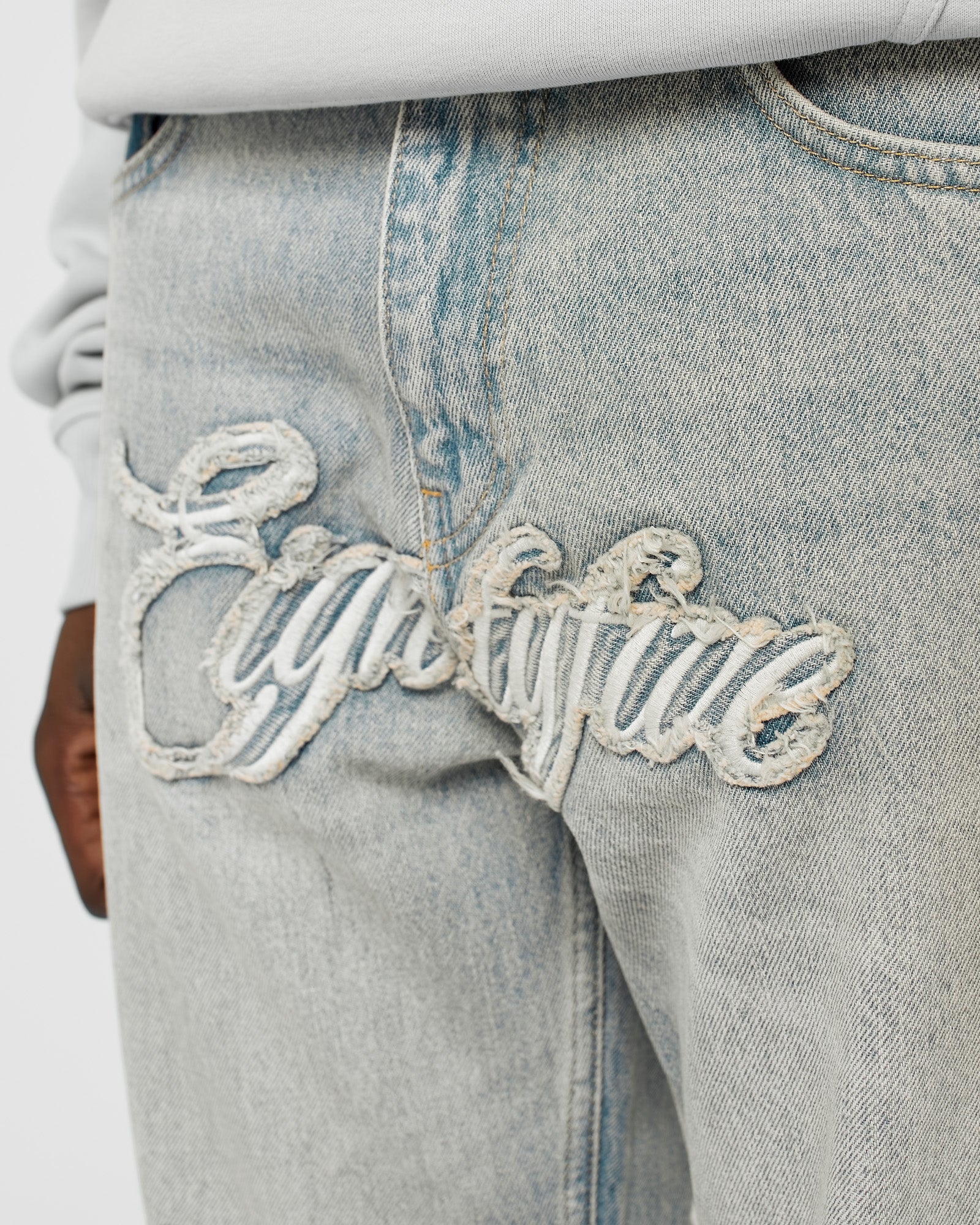 Jeans with Logo Patch