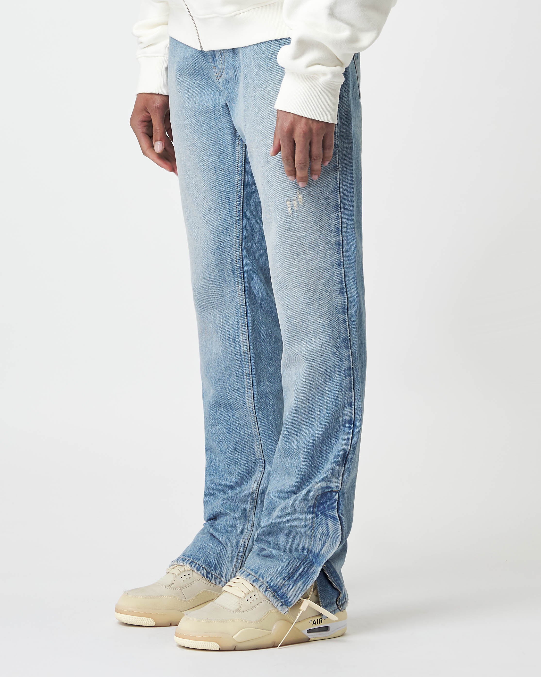 Distressed Zipped Jeans